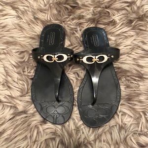Black hard leather coach sandals